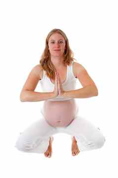 女人冥想怀孕瑜伽