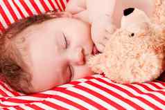 睡觉可爱的婴儿红色的白色条纹枕头