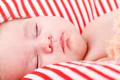 睡觉可爱的婴儿红色的白色条纹枕头