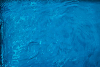 蓝色的水纹理摘要背景游泳池波设计