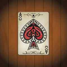王牌黑桃扑克卡片涂漆的木背景