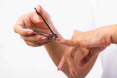 女人切割指甲手指指甲限幅器