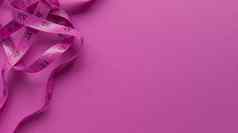 粉红色的厘米粉红色的背景简单的平躺柔和的纹理健身概念股票照片