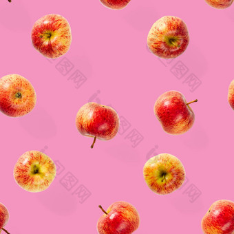 无缝的模式成熟的苹果热带水果摘要背景苹果无缝的模式粉红色的背景