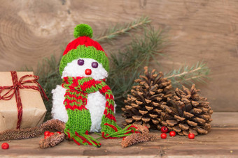 雪人使羊毛绒球的圣诞节背景