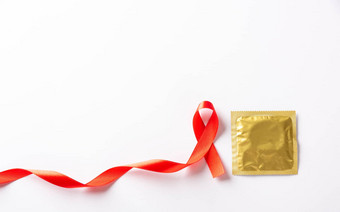 红色的弓丝带象征艾滋病毒艾滋病癌症意识<strong>避孕套</strong>