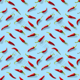 无缝的模式使红色的辣椒辣椒蓝色的背景最小的食物模式红色的热辣椒无缝的辣椒模式食物背景