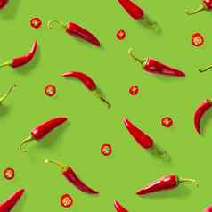 无缝的模式使红色的辣椒辣椒绿色背景最小的食物模式红色的热辣椒无缝的辣椒模式食物背景