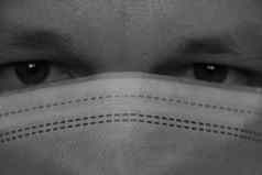男人。医疗保护面具抗感染保护冠状病毒强大的相机特写镜头流感大流行疫情