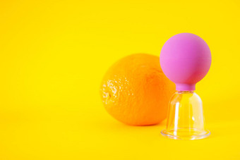 明亮的橙子Jar瘦身按摩健康的生活方式概念