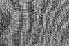 细灰色的织物网背景纹理