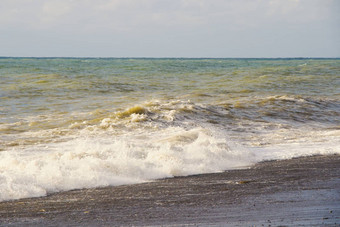 <strong>狂风暴雨</strong>的黑色的海水背景<strong>狂风暴雨</strong>的天气波溅巴统乔治亚州