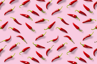 有创意的背景使红色的辣椒辣椒粉红色的背景最小的食物背景红色的热辣椒辣椒背景