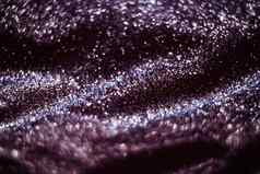 紫色的假期闪闪发光的闪闪发光的摘要背景奢侈品石