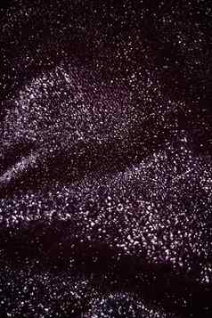 紫色的假期闪闪发光的闪闪发光的摘要背景奢侈品石