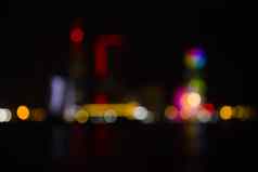 巴统晚上城市视图无重点模糊照片摩天大楼塔城市视图晚上