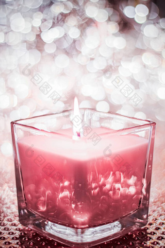 玫瑰芳香蜡烛圣诞节年闪闪发光的背气