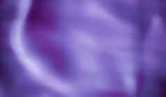 紫色的摘要艺术背景丝绸纹理波行