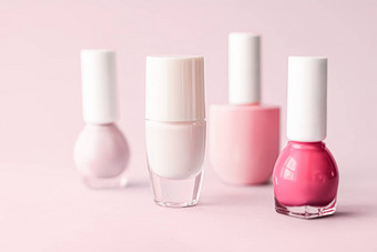 指甲波兰的瓶脸红粉红色的背景美品牌