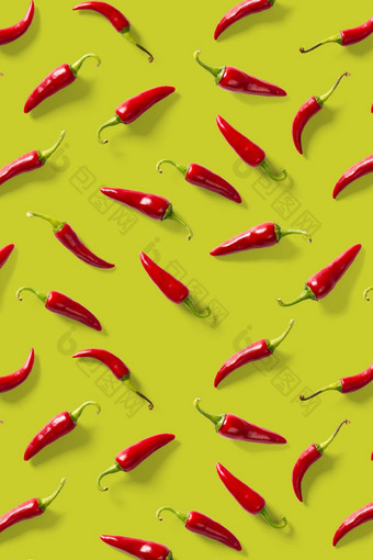 有创意的背景使红色的辣椒辣椒绿色背景最小的食物背景红色的热辣椒辣椒背景
