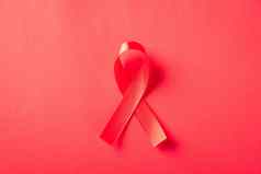 红色的弓丝带象征艾滋病毒艾滋病癌症意识