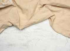 米色纺织厨房毛巾白色背景