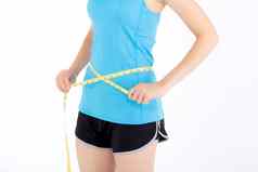 亚洲女人体育运动衣服身体苗条的测量腰