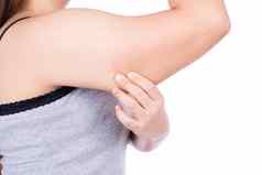 女人持有过度脂肪手臂孤立的白色背景女人捏手臂脂肪松弛皮肤重量损失苗条的身体健康的生活方式概念
