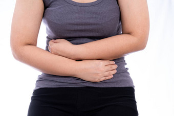 女人痛苦胃疼痛受伤孤立的白色背景健康护理医疗概念