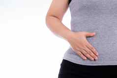 女人手触碰胃腰肝位置孤立的白色背景健康护理医疗概念
