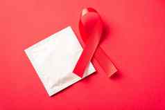 红色的弓丝带象征艾滋病毒艾滋病癌症意识避孕套