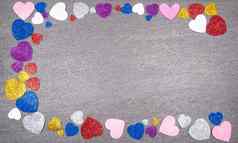 色彩斑斓的心闪闪发光的颜色灰色的花岗岩引入