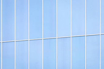 片段办公室建筑蓝色的镜像窗户