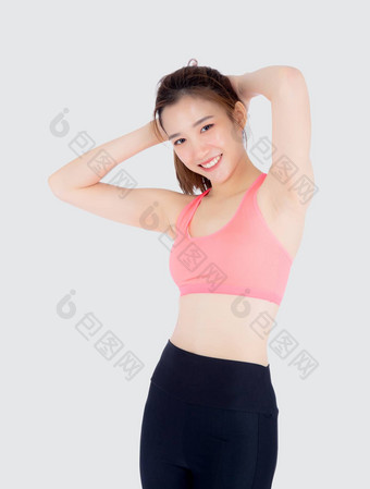 美丽的肖像年轻的亚洲女人站拉伸<strong>肌肉手臂</strong>