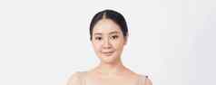 年轻的亚洲女人美脸使护肤品化妆品