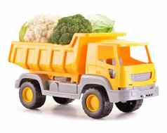 塑料转储跟踪玩具运输蔬菜孤立的白色