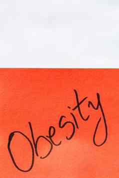 肥胖笔迹文本关闭孤立的橙色纸