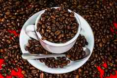 咖啡杯烤豆子红色的咖啡豆子背景