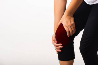 女人疼痛膝盖手联合持有膝盖痛苦