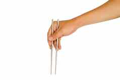 孤立的手持有筷子