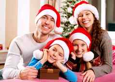 圣诞节家庭孩子们快乐微笑父母孩子们