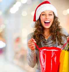 圣诞节购物快乐女人袋购物中心销售