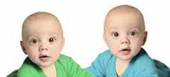 双胞胎婴儿男孩蓝色的绿色