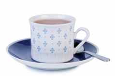 杯茶飞碟勺子孤立的白色背景