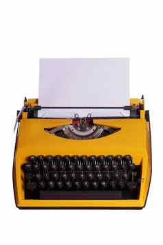 黄色的打字机白色纸