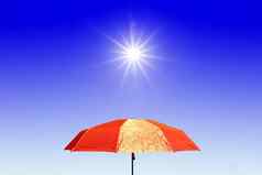 红色的伞明亮的太阳