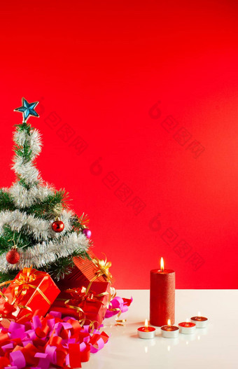 圣诞节礼物蜡烛红色的背景