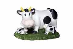 牛小腿绿色草坪上玩具孤立的白色背景