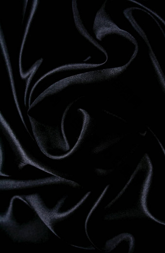 光滑的优雅的黑色的丝绸背景
