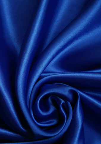 光滑的优雅的黑暗蓝色的丝绸背景